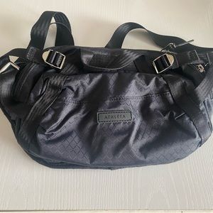 Excursion belt bag in black from Athleta.
